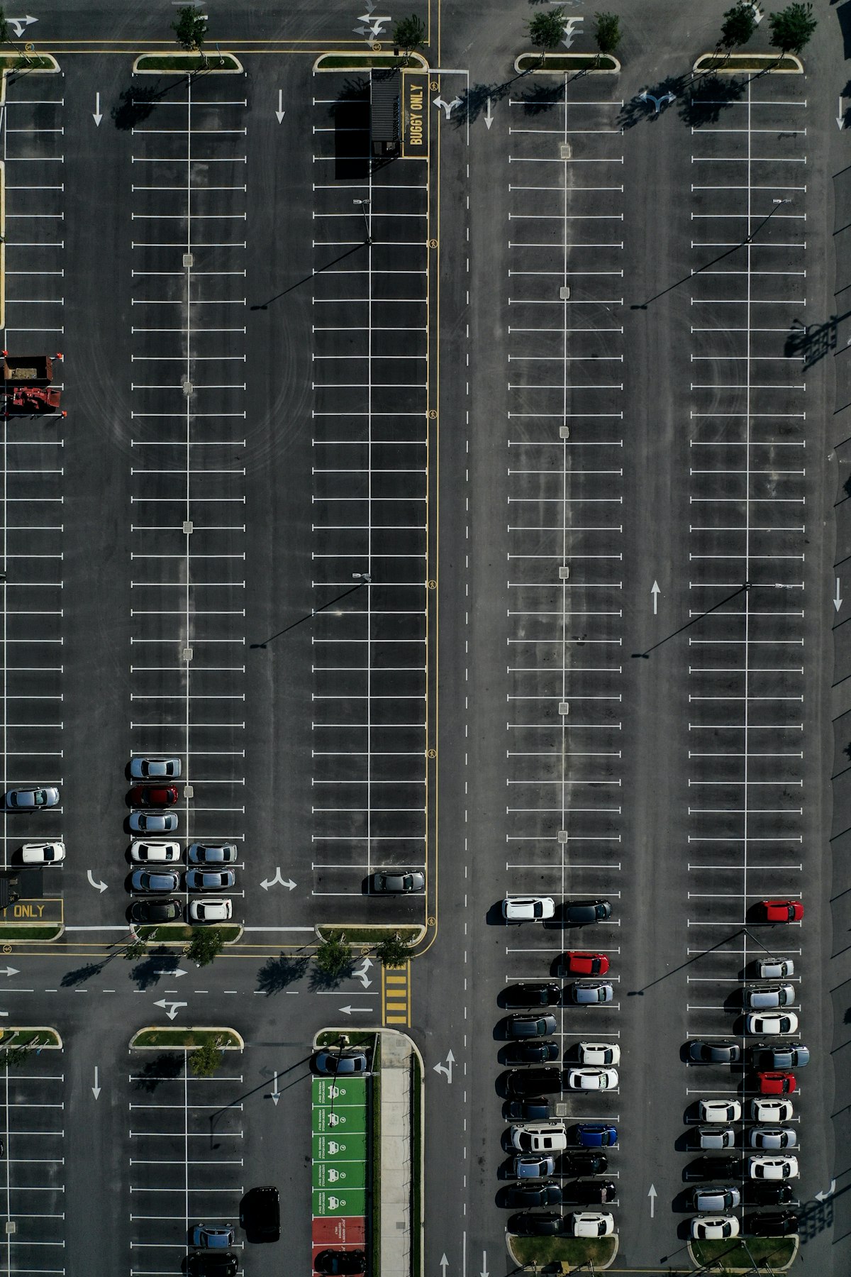 Cars parked in marked bays in a commercial car park